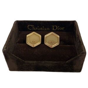 vintage Christian Dior gold-tone hexagonal cufflinks with the 'CD' logo, present